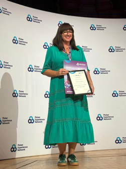 Sorcha Forbes, PCC Senior Practitioner & Health Inequalities Project Co-ordinator receiving the ‘Team of the Year’ Award at PENNA25 in Birmingham on October 1st.
